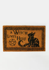 A Witch Lives Here Doormat