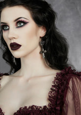 Haunting Sensations Cross Earrings