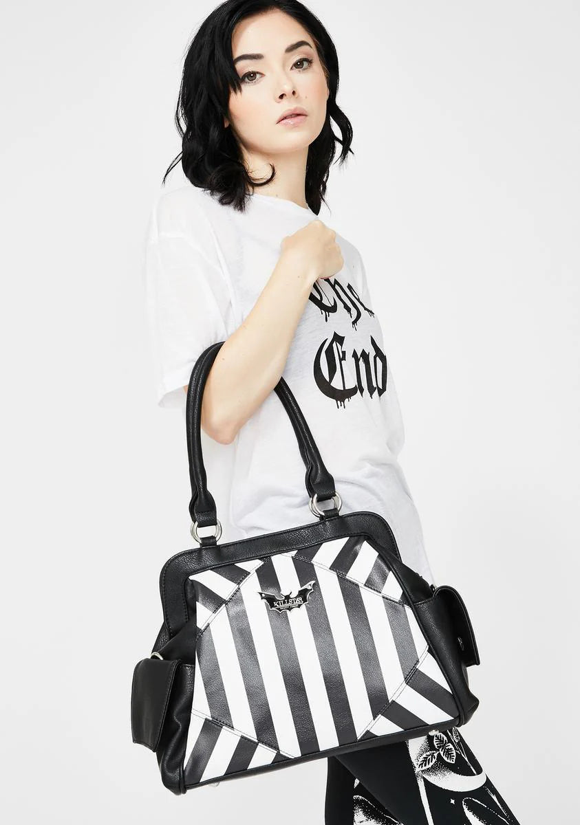 Never Trust The Living Handbag