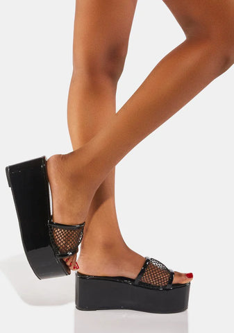 The Unknown Platform Sandals