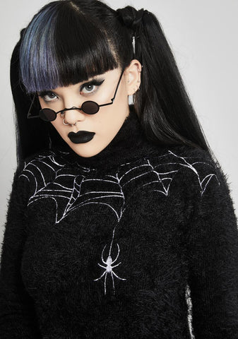 Web Of Deceit Fuzzy Sweater