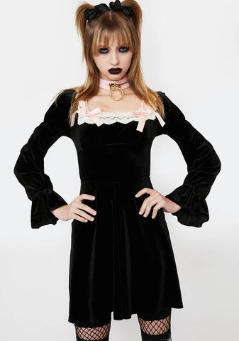 Black Mini Dress With Ruffles And Bows