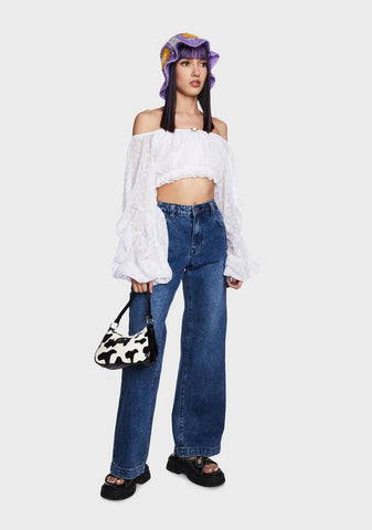 Ivory Animal Behavior Shoulder Bag