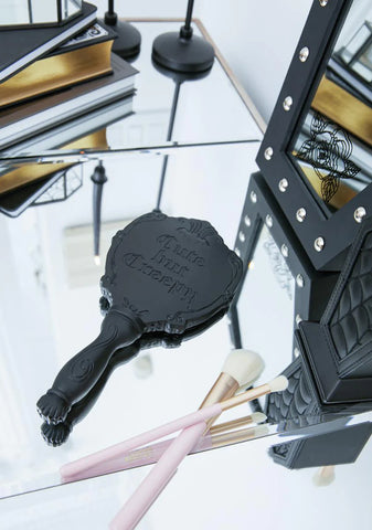 Cute But Creepy Hand Mirror