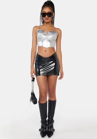 Silver Defiance In Her Corset Top