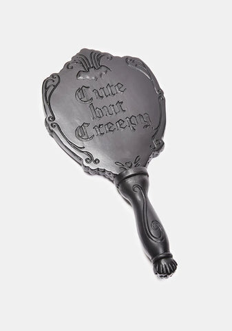 Cute But Creepy Hand Mirror