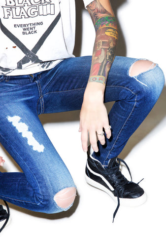 Dylan Distressed Skinny Jeans