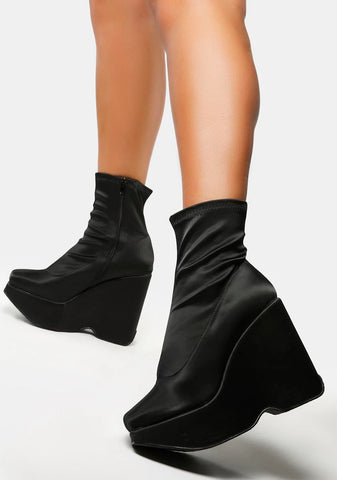 Wide Fit Versus Wedge Boots