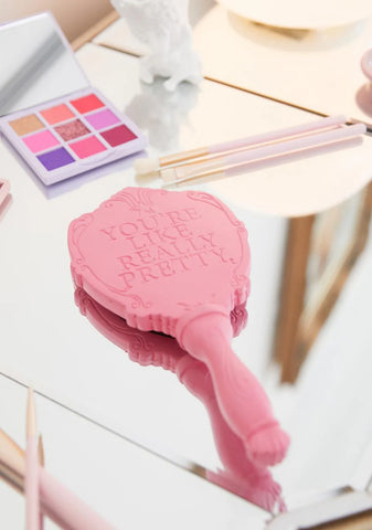 Sitting Pretty Hand Mirror