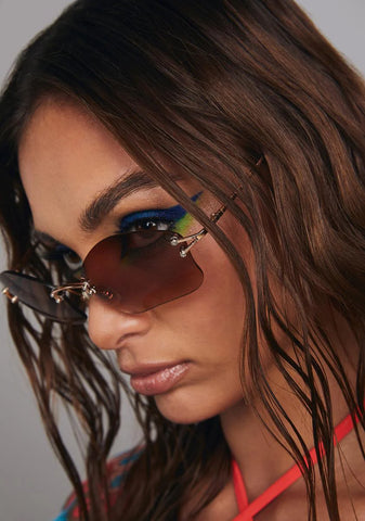 Cosmic Amber Gold Rimless Sunglasses