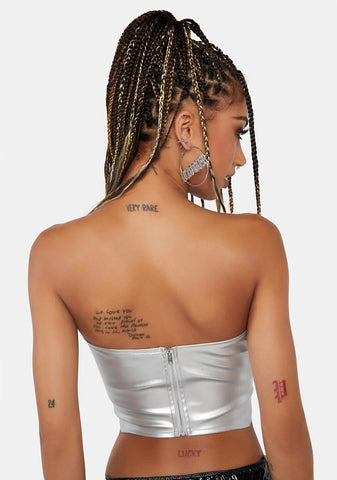 Silver Defiance In Her Corset Top