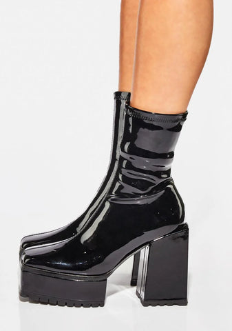 Patent Disappearing Act Platform Boots