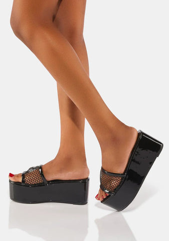 The Unknown Platform Sandals