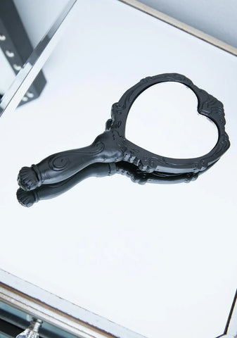 Cute But Creepy Hand Mirror